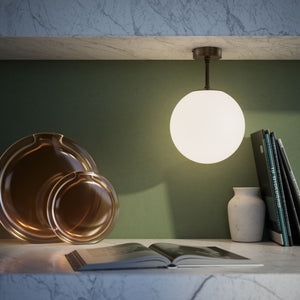 Brass ceiling light with opal glass globe, minimalist and elegant design for sophisticated interiors by Ghidini 1849 - Finish: OBM Bronze Satin Matt Brass