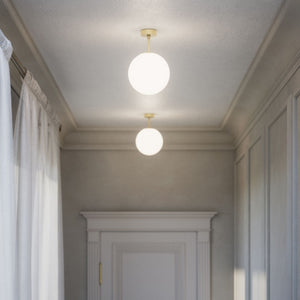 Brass ceiling light with opal glass globe, minimalist and elegant design for sophisticated interiors by Ghidini 1849 - Finish: OBV Bronze Satin Light Brass