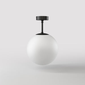 Brass ceiling light with opal glass globe, minimalist and elegant design for sophisticated interiors by Ghidini 1849 - Finish: ONO Matt Black