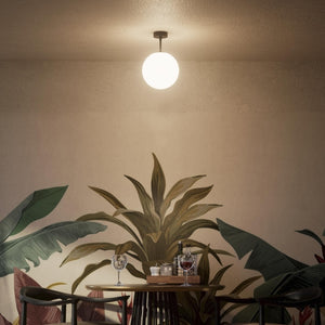 Brass ceiling light with opal glass globe, minimalist and elegant design for sophisticated interiors by Ghidini 1849 - Finish: ONO Matt Black