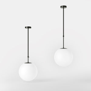 Art Deco globe pendant light with frosted glass sphere and adjustable brass structure Made in Italy design by Ghidini 1849 - Finish: ONO Matt Black