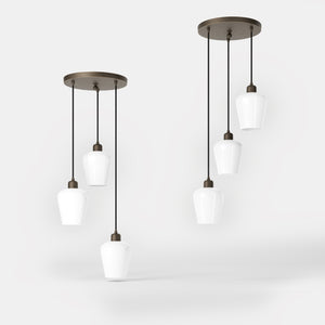 Pendant light with three white glass diffusers, brass details, and adjustable cables for elegant interiors by Ghidini 1849 - Finish: OBM Bronze Satin Matt Brass