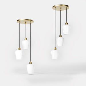 Pendant light with three white glass diffusers, brass details, and adjustable cables for elegant interiors by Ghidini 1849 - Finish: OBV Bronze Satin Light Brass