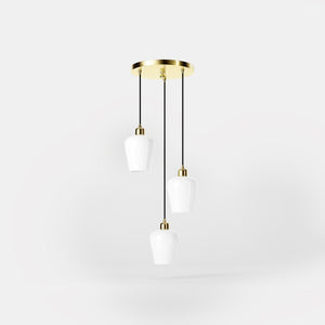 Pendant light with three white glass diffusers, brass details, and adjustable cables for elegant interiors by Ghidini 1849 - Finish: OLV Polished Brass