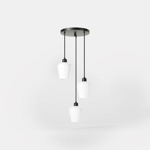 Pendant light with three white glass diffusers, brass details, and adjustable cables for elegant interiors by Ghidini 1849 - Finish: ONO Matt Black