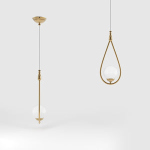 Art Deco teardrop pendant light in brass with glossy white glass sphere adjustable cable elegant design lighting decor by Ghidini 1849 - Finish: OBS Bronze Satin Brass