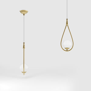 Art Deco teardrop pendant light in brass with glossy white glass sphere adjustable cable elegant design lighting decor by Ghidini 1849 - Finish: OBV Bronze Satin Light Brass