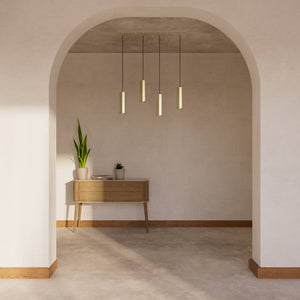 Modern pendant lamp with four brass cylinders and linear bar, height-adjustable pendants with fabric cables, minimalist Venere design by Ghidini 1849 - Finish: OBV Bronze Satin Light Brass