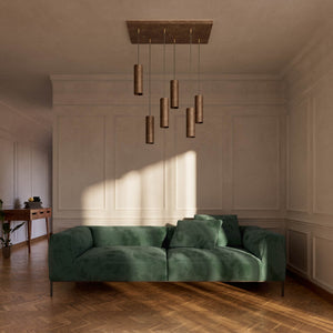 Modern pendant lamp with six brass cylinders arranged in cascade pattern, rectangular base, adjustable fabric cables, Venere design by Ghidini 1849 - Finish: OAS Antique Brass