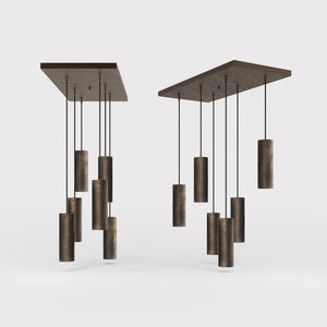 Modern pendant lamp with six brass cylinders arranged in cascade pattern, rectangular base, adjustable fabric cables, Venere design by Ghidini 1849 - Finish: OBM Bronze Satin Matt Brass