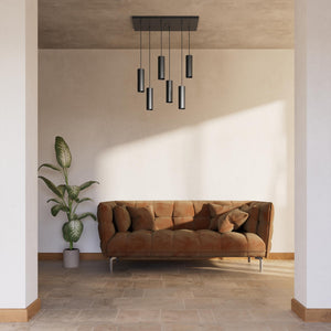 Modern pendant lamp with six brass cylinders arranged in cascade pattern, rectangular base, adjustable fabric cables, Venere design by Ghidini 1849 - Finish: ONO Matt Black