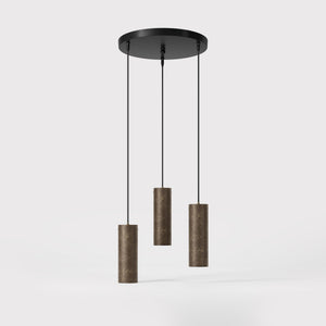 Modern pendant lamp with three brass cylinders and round matte black iron base, height-adjustable pendants, Venere design collection by Ghidini 1849 - Finish: OAS Antique Brass