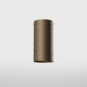 Cylinder ceiling lamp in brass with compact body installed on the ceiling of an elegant corridor by Ghidini 1849 - Finish: OBM Bronze Satin Matt Brass