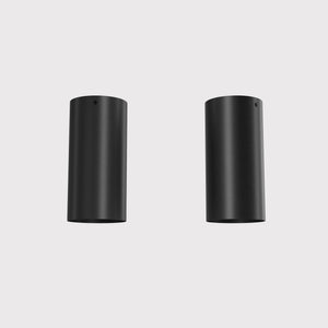 Cylinder ceiling lamp in brass with compact body installed on the ceiling of an elegant corridor by Ghidini 1849 - Finish: ONO Matt Black