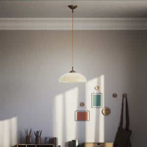 Art Nouveau brass pendant light with floral decorated canopy and large dome-shaped frosted glass diffuser with geometric pattern by Ghidini 1849 - Finish: OAS Antique Brass