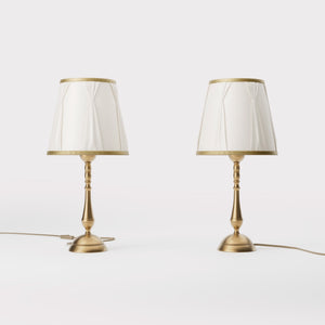 Classic brass table lamp with ivory fabric shade and decorative trims, round base and turned stem by Ghidini 1849 - Dimension/Finish: Small / OBS Bronze Satin Brass