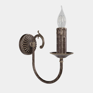 Classic wall lamp in brass with curved arm and candle-effect bulb holder, elegant vintage design by Ghidini 1849 - Finish: OAS Antique Brass