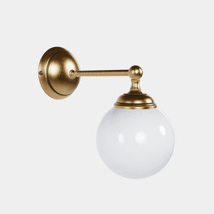 Brass wall lamp with white glass globe, vintage contemporary design for interiors by Ghidini 1849 - Finish: OBS Bronze Satin Brass
