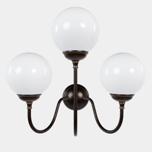 Brass wall lamp with three glossy white glass globes, elegant design, interior lighting by Ghidini 1849 - Finish: OBM Bronze Satin Matt Brass
