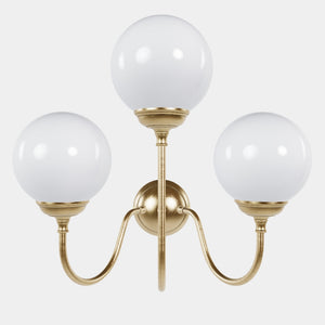 Brass wall lamp with three glossy white glass globes, elegant design, interior lighting by Ghidini 1849 - Finish: OBV Bronze Satin Light Brass