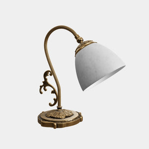 Art Nouveau brass table lamp with a spotted white glass shade and adjustable joint, ideal for elegant spaces by Ghidini 1849 - Finish: OBS Bronze Satin Brass