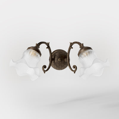 Floral brass wall light with frosted glass shades and round base by Ghidini 1849 - Finish: OAS Antique Brass