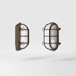 Nautical outdoor wall lamp in brass with protective grid and glass, maritime style for outdoor lighting by Ghidini 1849 - Finish: OBM Bronze Satin Matt Brass