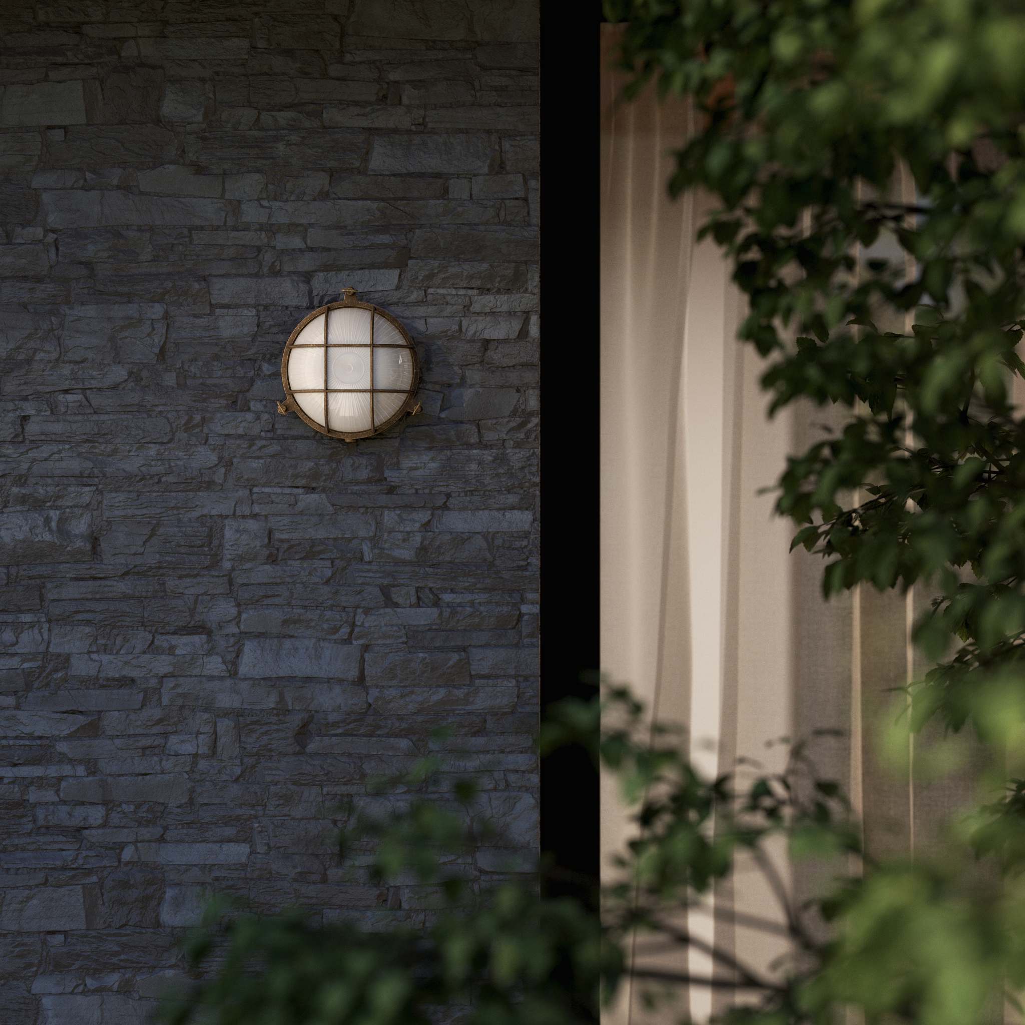 Round outdoor wall lamp in brass with protective grid and glass, marine style for outdoor lighting by Ghidini 1849 - Finish: OAS Antique Brass