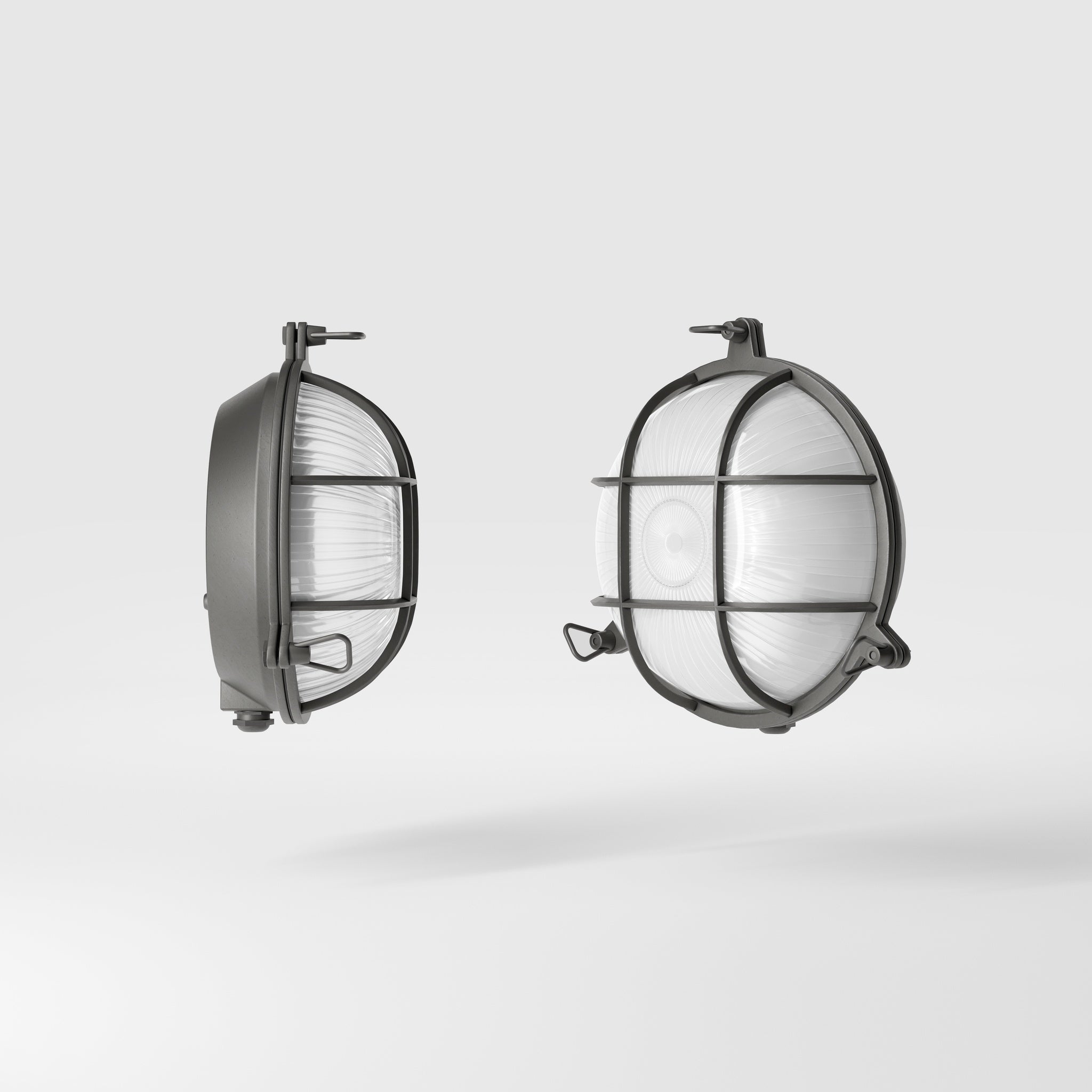 Round outdoor wall lamp in brass with protective grid and glass, marine style for outdoor lighting by Ghidini 1849 - Finish: OBR Dark Bronze