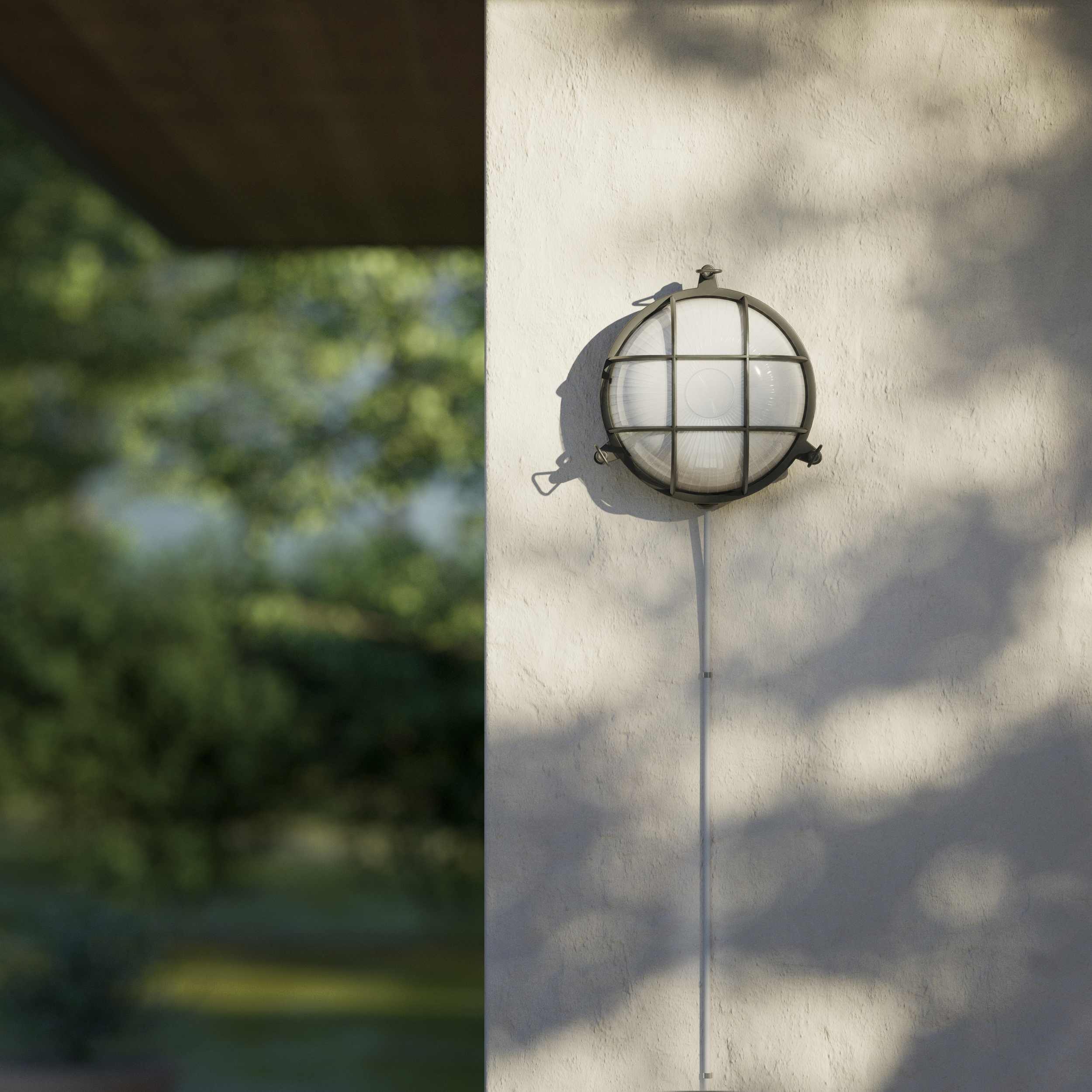Round outdoor wall lamp in brass with protective grid and glass, marine style for outdoor lighting by Ghidini 1849 - Finish: OBR Dark Bronze