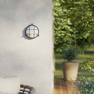 Round outdoor wall lamp in brass with protective grid and glass, marine style for outdoor lighting by Ghidini 1849 - Finish: OBR Dark Bronze