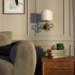 Baroque brass wall lamp with fleur-de-lis motif and decorative scrolls, ivory pleated shade, elegant classic style Made in Italy - Finish: OAS Antique Brass