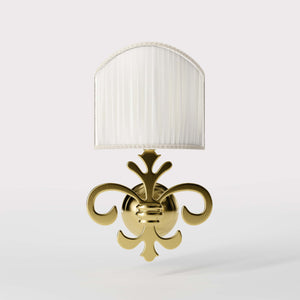 Baroque brass wall lamp with fleur-de-lis motif and decorative scrolls, ivory pleated shade, elegant classic style Made in Italy - Finish: OLV Polished Brass