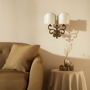 Neoclassical twin brass wall lamp with fleur-de-lis motif and symmetrical scrolls, white pleated shades, elegant Italian design - Finish: OBM Bronze Satin Matt Brass