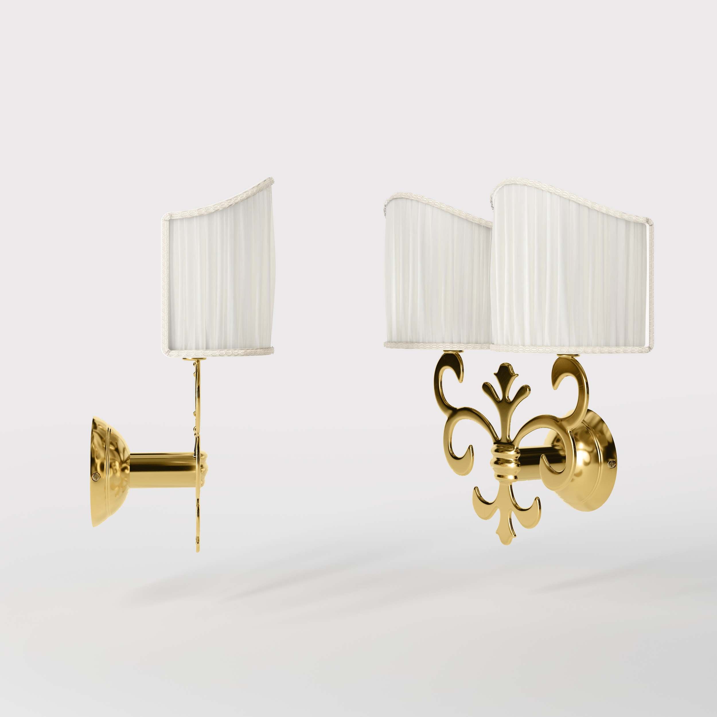 Neoclassical twin brass wall lamp with fleur-de-lis motif and symmetrical scrolls, white pleated shades, elegant Italian design - Finish: ORO 24K Gold Plated