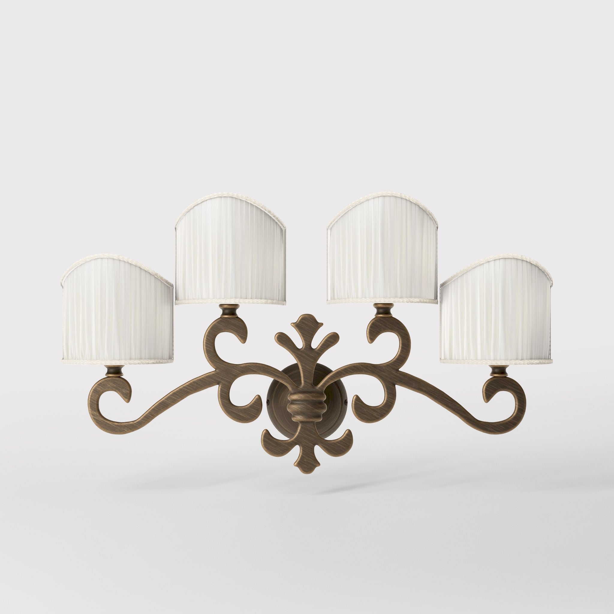 Classical four-light brass wall lamp with central fleur-de-lis and decorative scrolls, white pleated shades, refined Italian design - Finish: OBM Bronze Satin Matt Brass
