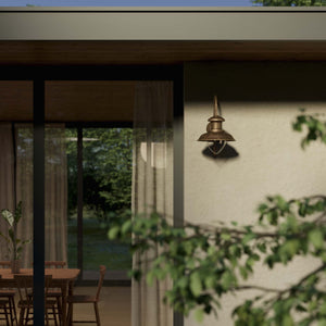 Marine style outdoor wall lamp with teardrop glass shade and shaped brass structure from the Amalfi collection by Ghidini 1849 - Finish: OAS Antique Brass