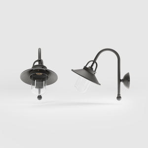 Outdoor brass wall lamp with curved arm protective hood and transparent glass diffuser rustic style Giada collection by Ghidini 1849 - Finish: OBR Dark Bronze