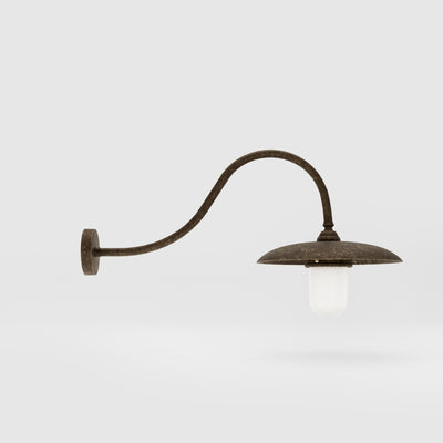 Vintage brass outdoor wall lamp with curved arm and protected glass by Ghidini 1849 - Finish: OAS Antique Brass