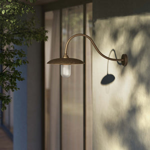 Vintage brass outdoor wall lamp with curved arm and protected glass by Ghidini 1849 - Finish: OBM Bronze Satin Matt Brass