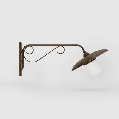 Brass outdoor wall lamp with decorative arm and protected glass by Ghidini 1849 - Finish: OAS Antique Brass