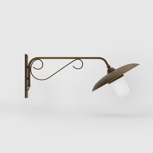 Brass outdoor wall lamp with decorative arm and protected glass by Ghidini 1849 - Finish: OBM Bronze Satin Matt Brass