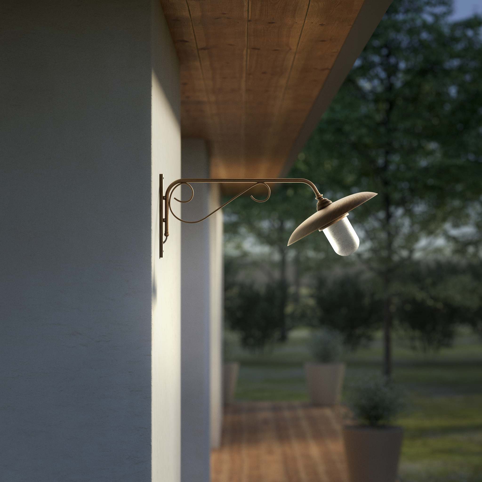 Brass outdoor wall lamp with decorative arm and protected glass by Ghidini 1849 - Finish: OBM Bronze Satin Matt Brass