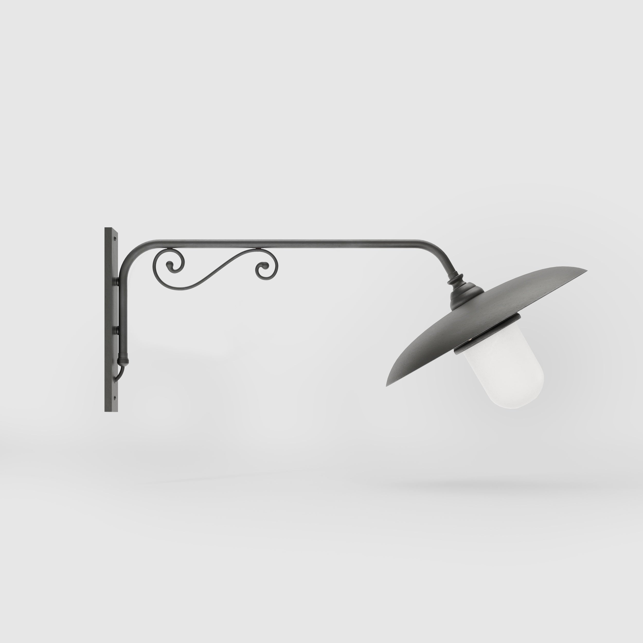 Brass outdoor wall lamp with decorative arm and protected glass by Ghidini 1849 - Finish: OBR Dark Bronze