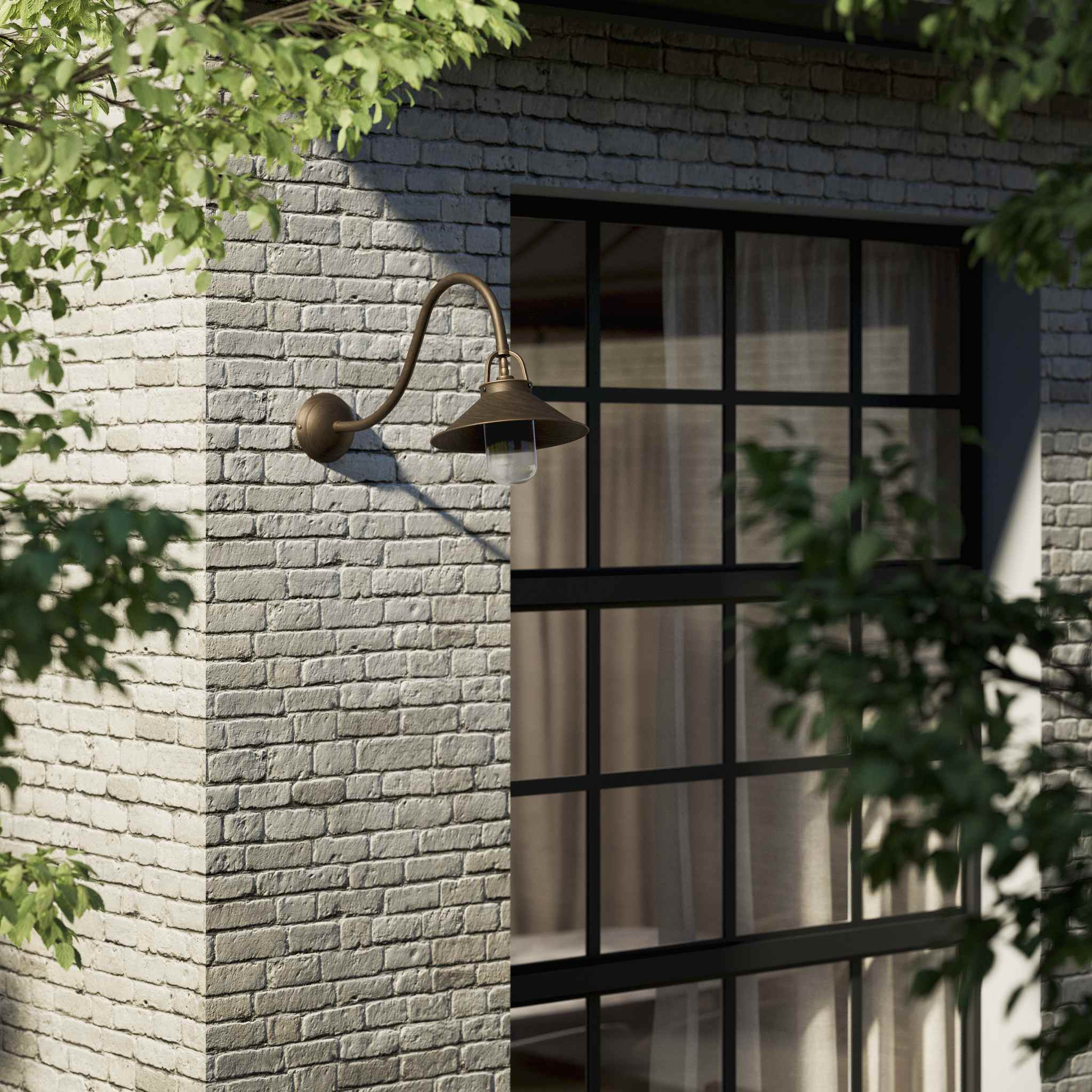 Classic style outdoor brass wall lamp with curved arm conical shade and transparent glass diffuser Giada collection by Ghidini 1849 - Finish: OBM Bronze Satin Matt Brass