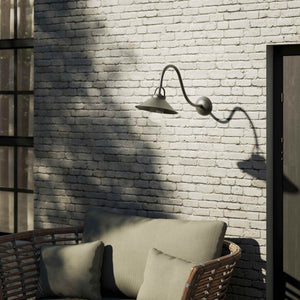 Classic style outdoor brass wall lamp with curved arm conical shade and transparent glass diffuser Giada collection by Ghidini 1849 - Finish: OBR Dark Bronze