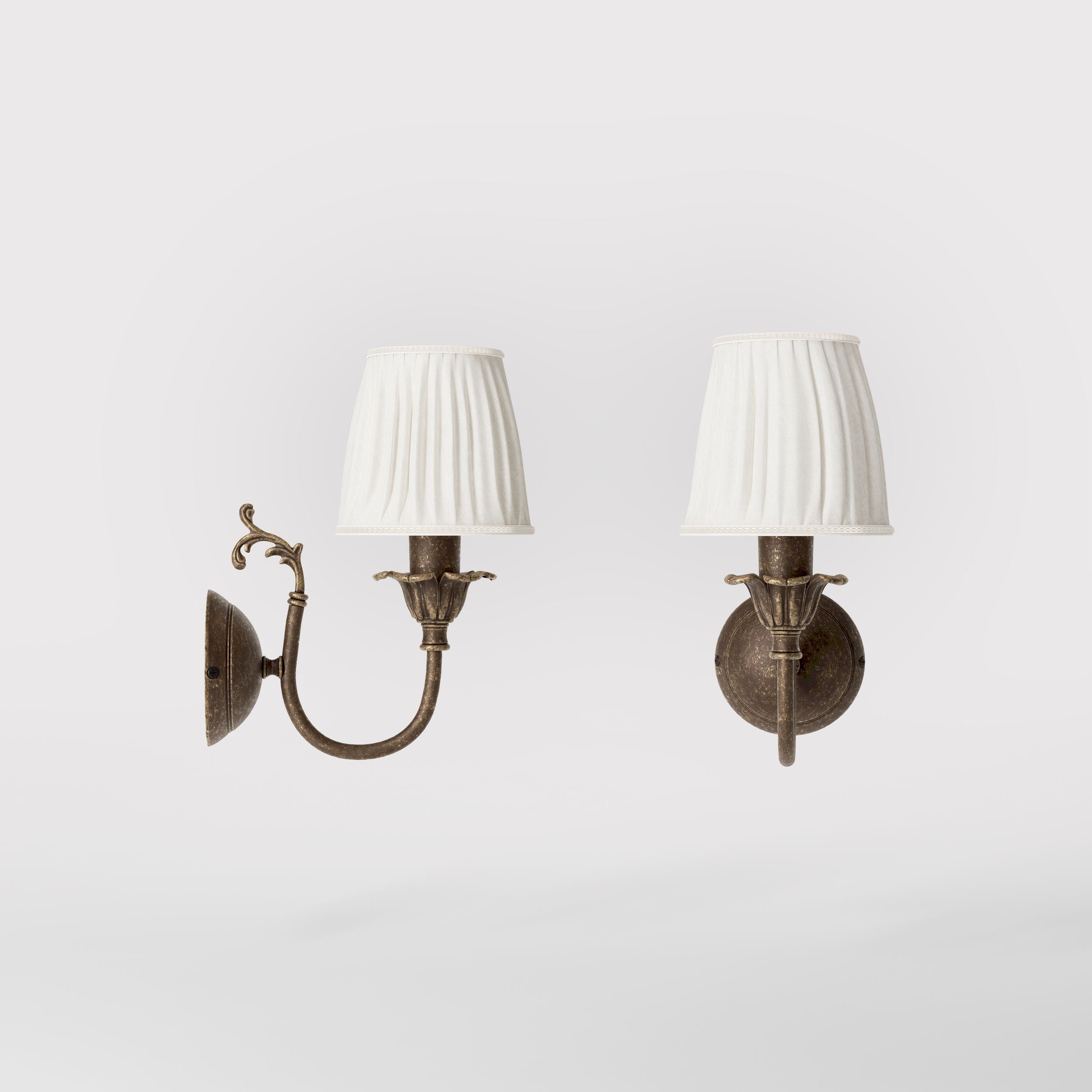 Classic brass wall lamp with pleated ivory white shade, decorative arm and floral details for elegant wall lighting - Finish: OAS Antique Brass