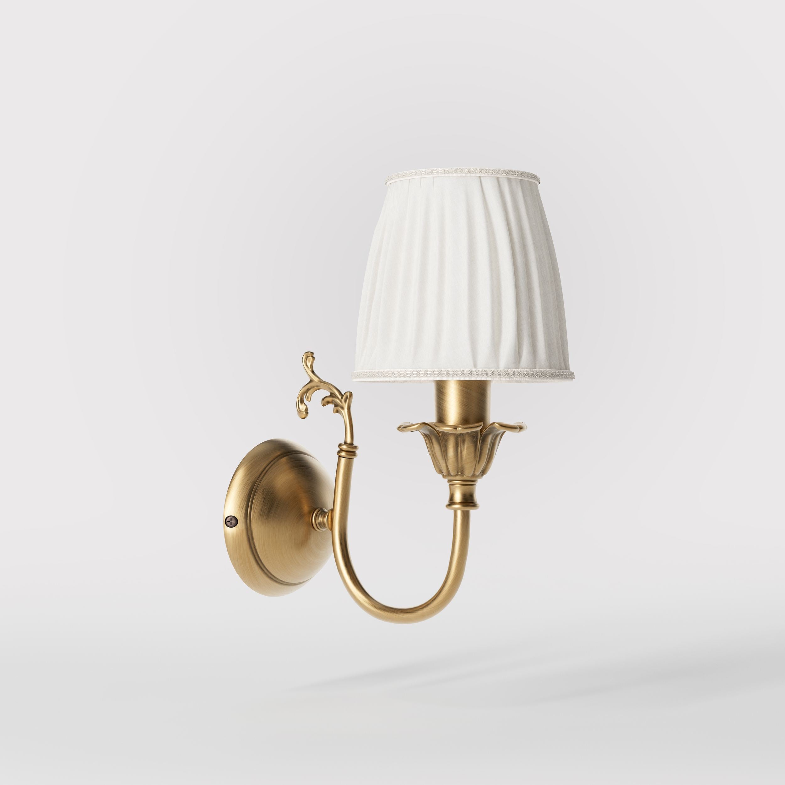 Classic brass wall lamp with pleated ivory white shade, decorative arm and floral details for elegant wall lighting - Finish: OBS Bronze Satin Brass
