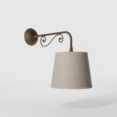 Classic brass wall lamp with scrollwork arm and linen-effect fabric shade European style Made in Italy design by Ghidini 1849 - Finish: OAS Antique Brass