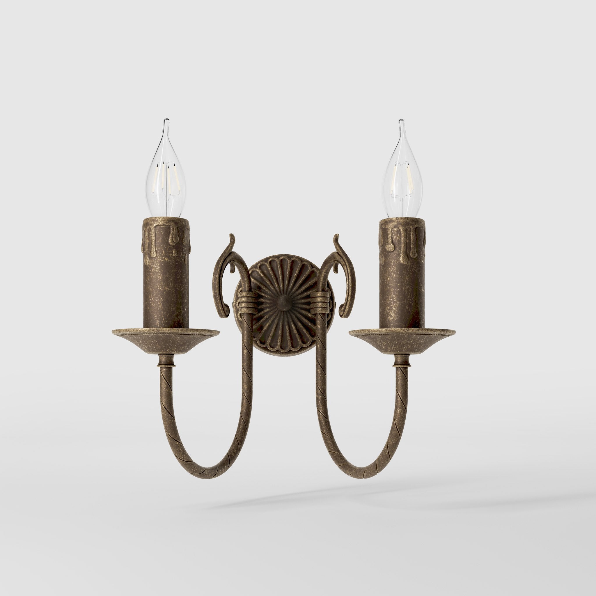 Classic double wall lamp in brass with fan-decorated central rosette, intertwined arms and lamp holders with dripping wax pattern by Ghidini 1849 - Finish: OAS Antique Brass